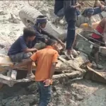 people removing debris 1776605906